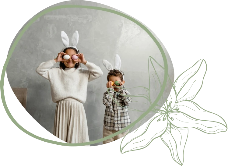 A woman and a child wear bunny ears and pose playfully in front of a light gray wall, creating a festive atmosphere.