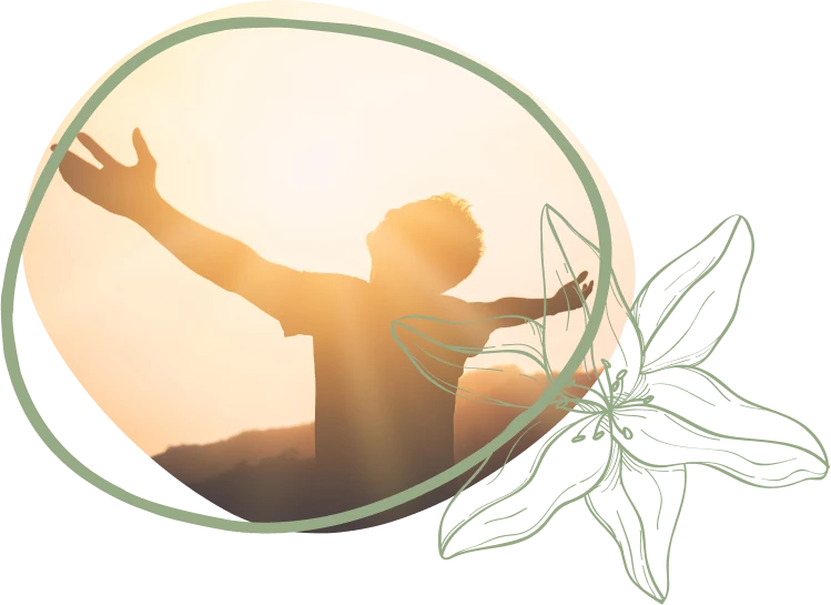 A silhouette of a person joyfully raising their arms in front of a bright sunset, symbolizing freedom and positivity.