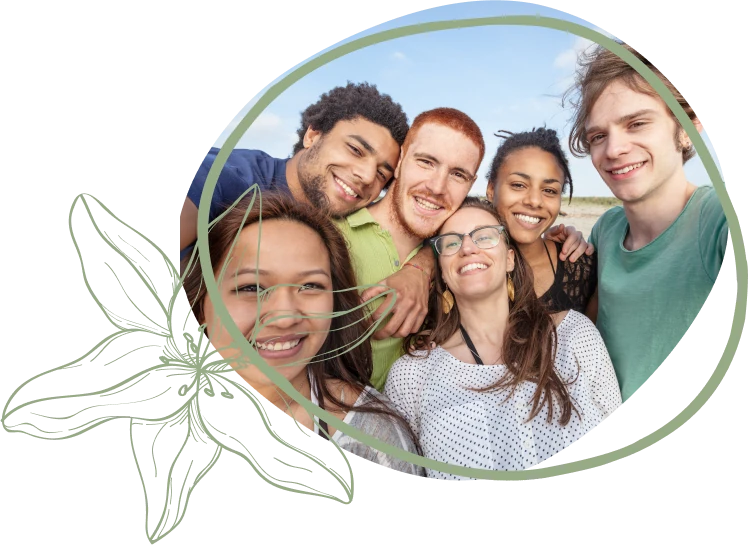 A group of diverse friends smiling and posing together outdoors with a clear sky in the background, surrounded by a floral design.